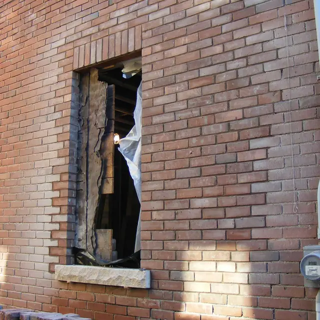 A new window opening framed in brick