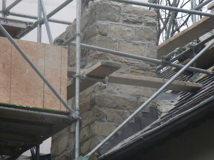 Before: historic stone chimney