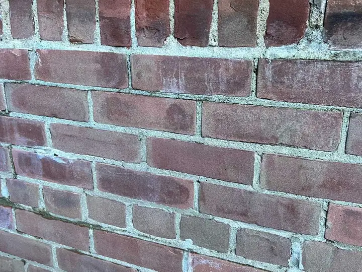 Before: brick wall